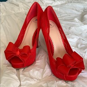 Red lace bow heels